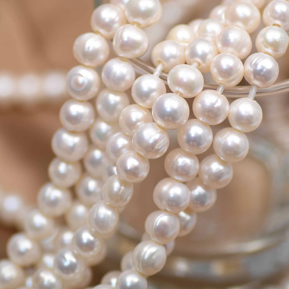 10-11mm 4A Large White Round F - Natural Freshwater Pearl Strand Loose Beads recension och pris