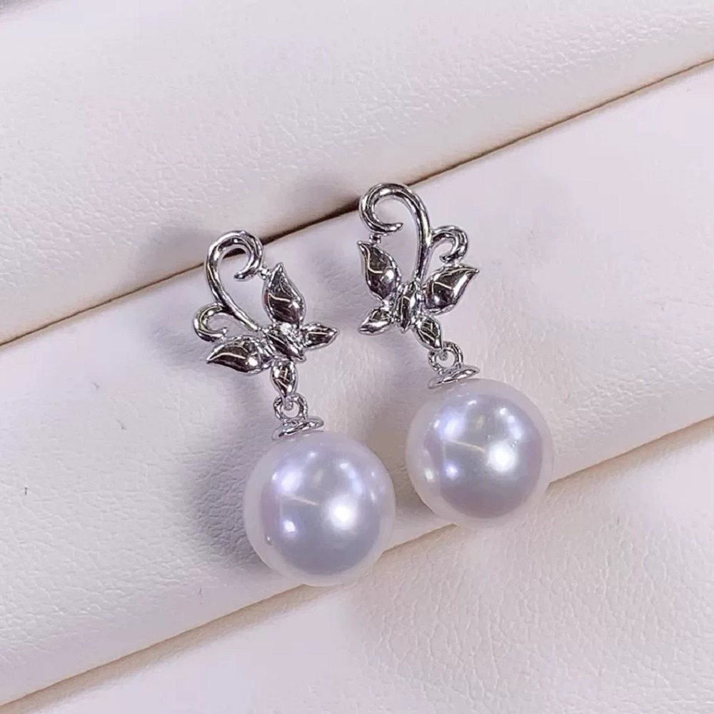 Fashionable Butterfly Dynamic  - Akoya Pearl Stud Earrings Sterling Silver recension och pris